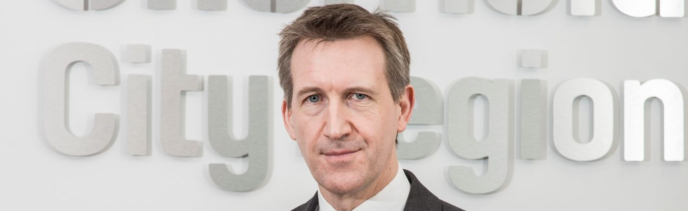 Dan Jarvis in front of SCR plaque