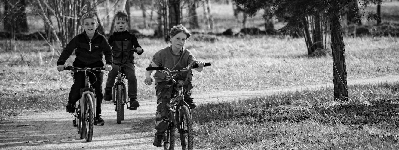 young kids cycling